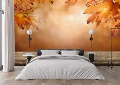 A wood table product display with copyspace and a golden brown autumn background of leaves for Thanksgiving and other seasonal messages. Wall mural