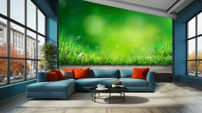 A wooden table product display with lush green  garden background of grass and blurred foliage. Wall mural