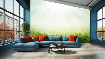 Lush spring green grass background with a sunny summer blue sky over fields and bluebell pastures. Wall mural