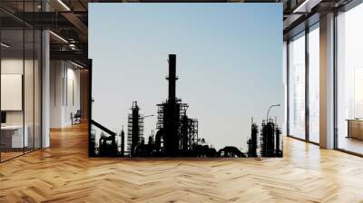 Silhouette of an oil refinery with chimneys Wall mural