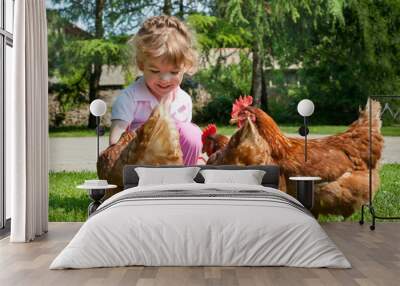 girl feeding chickens Wall mural