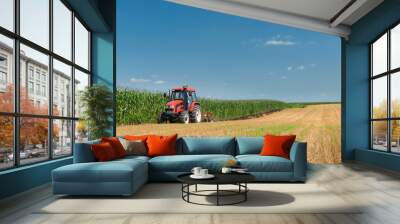 Tractor plowing Wall mural