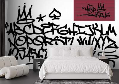 Spray graffiti tagging font and signs (crown, heart, star, arrow, dot, quotation mark, number, spade). ''Hip-hop king''  quote on brick wall background. Wall mural