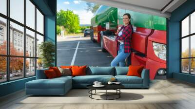 A young woman poses in front of her first cargo truck before embarking on a cross-country tour Wall mural