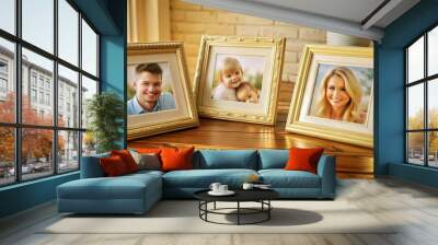 framed family photos on white wooden table indoors Wall mural