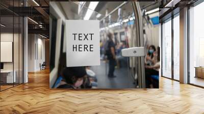 .Blank white ads space advertising board for text on subway or sky train, copy space, traveling in the city .. Wall mural