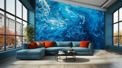 A striking blue abstract fluid pattern highlighted with lighter tones, reminiscent of liquid motion and ethereal fluidity in an artistic style. Wall mural