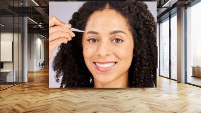 Eyebrow grooming, face tweezer and portrait of black woman with dermatology and facial hair cleaning. Skincare, epilation and clean beauty routine of a young model in a studio doing skin pore removal Wall mural