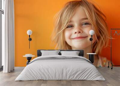 Portrait of a smiling blonde girl with green eyes Wall mural