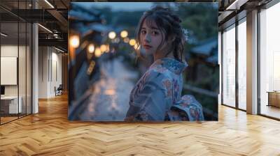 Portrait of a young Japanese woman in a kimono standing in a traditional Japanese street Wall mural