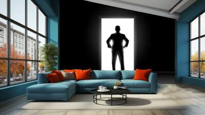 Silhouette of man standng in doorway. Wall mural