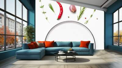 Empty plate with greens herbs and spices around Wall mural