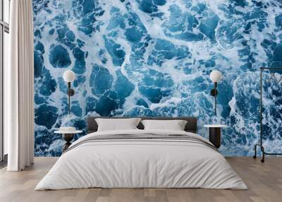 Background: white foam on sea water. Wall mural