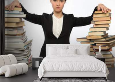 girl and two large piles of books Wall mural