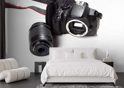 black digital professional camera and lens isolated closeup on white background Wall mural