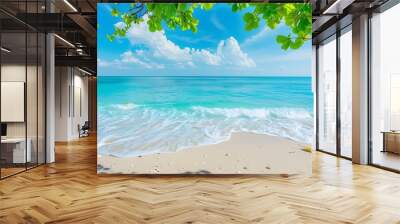 Peaceful Ocean View with Green Leaves on a Sunny Day Wall mural