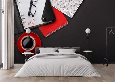 black background red coffee cup note pad alarm clock flower diary scores keyboard empty space desktop Wall mural