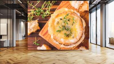 French baked Camembert cheese with thyme and baguette bread Wall mural