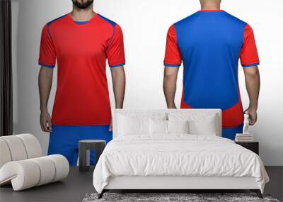 Soccer player in sports uniform blue-red shirt and shorts on isolated white background. Mockup football uniform front and back view Wall mural