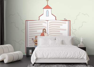 Christianity, religion, bible concept. Huge religious book with Jesus and children characters waving their hands showing importance of religion vector illustration  Wall mural