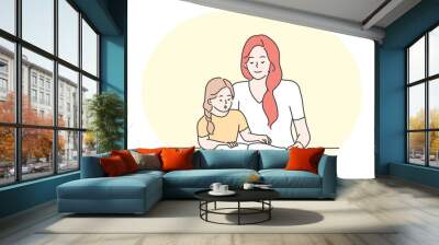 Happy leisure and activities at home with children concept. Young woman mother cartoon character reading, learning letters or words together with her small daughter at home. Relax, rest, family Wall mural