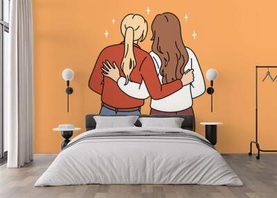 Lesbian love and homosexual couple concept. Two girls standing and embracing each other feeling loving couple vector illustration  Wall mural