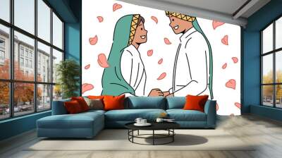 Smiling Arabic bride and groom wedding ceremony Wall mural