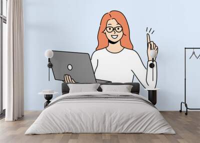 Smiling businesswoman with laptop in hands put finger in air excited about innovative idea. Happy woman employee generate business thought work on computer. Vector illustration.  Wall mural