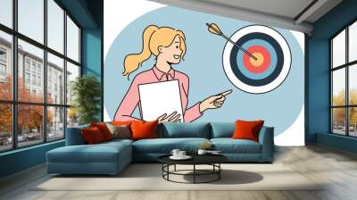 Smiling successful businesswoman posing near arrow reaching hitting target. Confident motivated female employee show aim achievement. Success at work. Vector illustration. Wall mural