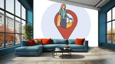 Traveling woman with suitcase near giant GPS pin for concept of navigation and transport logistics for tourism. Geotag with girl going on business trip holding bag on wheels and mobile phone Wall mural