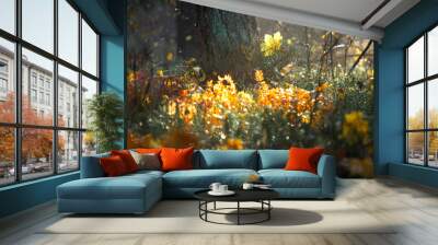 Beautiful nature background of autumn grass. A ray of light break through branches  Wall mural