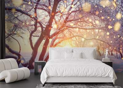 Christmas holiday background. Winter nature landscape in shining bokeh. Wall mural