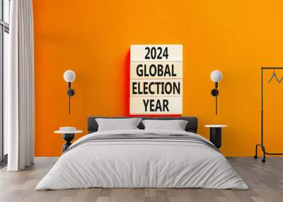 2024 global election year symbol. Concept words 2024 global election year on beautiful wooden block. Beautiful orange table orange background. Business 2024 global election year concept. Copy space. Wall mural