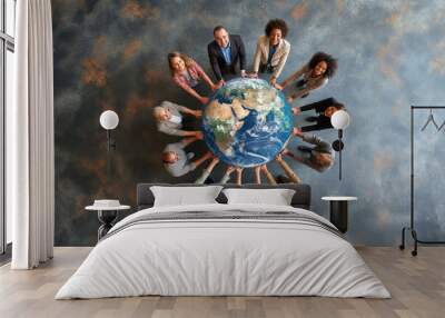 A group of business people holding a planet earth globe together Wall mural