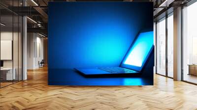 A laptop computer with an illuminated display (three-dimensional illustration) Wall mural