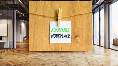 Adaptable workplace symbol. Concept words Adaptable workplace on beautiful white paper on wooden clothespin. Beautiful wooden background. Business Adaptable workplace concept. Copy space. Wall mural