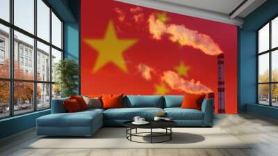 Against the background of the flag of China, smoke is emitting from the pipes of the enterprise, polluting the air. Wall mural