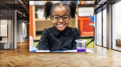 An African American schoolgirl studying science in the classroom. An African American schoolgirl studying biology with a bunsen burner experiment. September education back to school concept. Wall mural