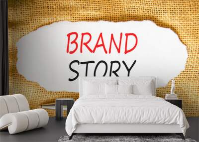 Brand story branding symbol. Concept words Brand story on beautiful white paper. Beautiful canvas background. Beautiful metallic pen. Business brand story branding concept. Copy space. Wall mural