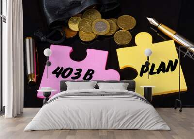 Coins are scattered on the black surface, there is a pen and puzzles on which it is written - 403B PLAN Wall mural