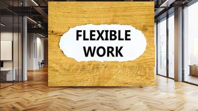 Flexible work symbol. Concept words Flexible work on beautiful white paper. Beautiful wooden wall background. Business Flexible work concept. Copy space. Wall mural