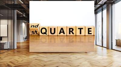 From 1st first to 2nd second quarter symbol. Turned wooden cubes and changed words 1st quarter to 2nd quarter. Beautiful wooden table white background. Business happy 2nd quarter concept. Copy space. Wall mural