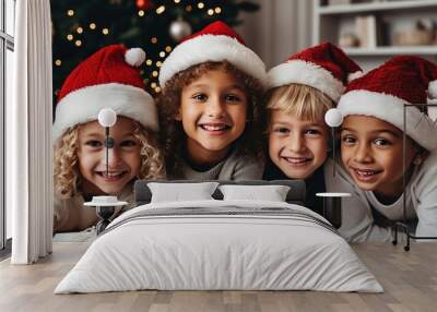 Group portrait of diverse kids girls with decorated Christmas trees looking at camera Wall mural