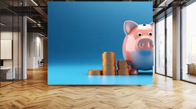 Pink pig piggy bank next to a stack of gold coins, isolated on blue background Wall mural