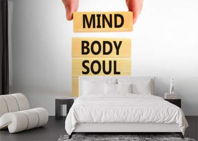 Mind body soul spirit symbol. Concept words Mind Body Soul Spirit on wooden blocks. Beautiful white table white background. Businessman hand. Lifestyle mind body soul spirit concept. Copy space. Wall mural