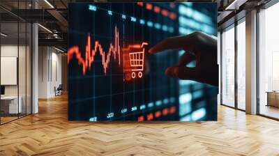 On a virtual screen, a businessman touches a graph of ecommerce sales growth with shopping carts as a representation of future corporate growth Wall mural