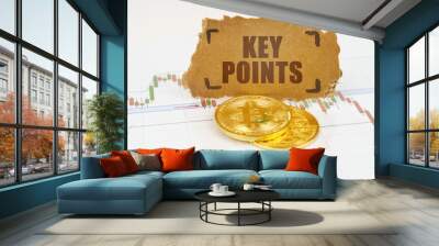 On the chart with quotes, there are bitcoins and there is a sign with the inscription - KEY POINTS Wall mural