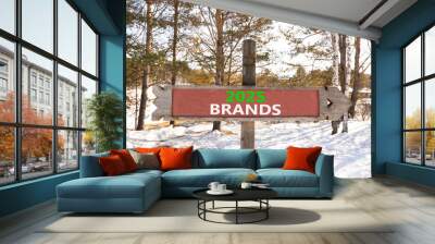 Planning 2025 brands new year symbol. Concept words 2025 Brands on beautiful wooden old retro vintage road sign. Beautiful winter forest background. Business 2025 brands new year concept. Copy space. Wall mural