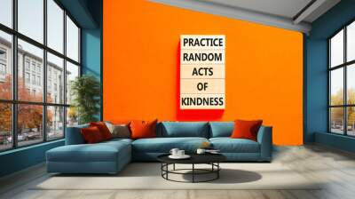 Practice random kind of kindness symbol. Concept words Practice random kind of kindness on wooden block. Beautiful orange table orange background. Business practice kindness concept. Copy space. Wall mural