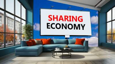 Sharing economy symbol. Concept words Sharing economy on beautiful white billboard. Beautiful blue sky white cloud background. Business sharing economy concept. Copy space. Wall mural